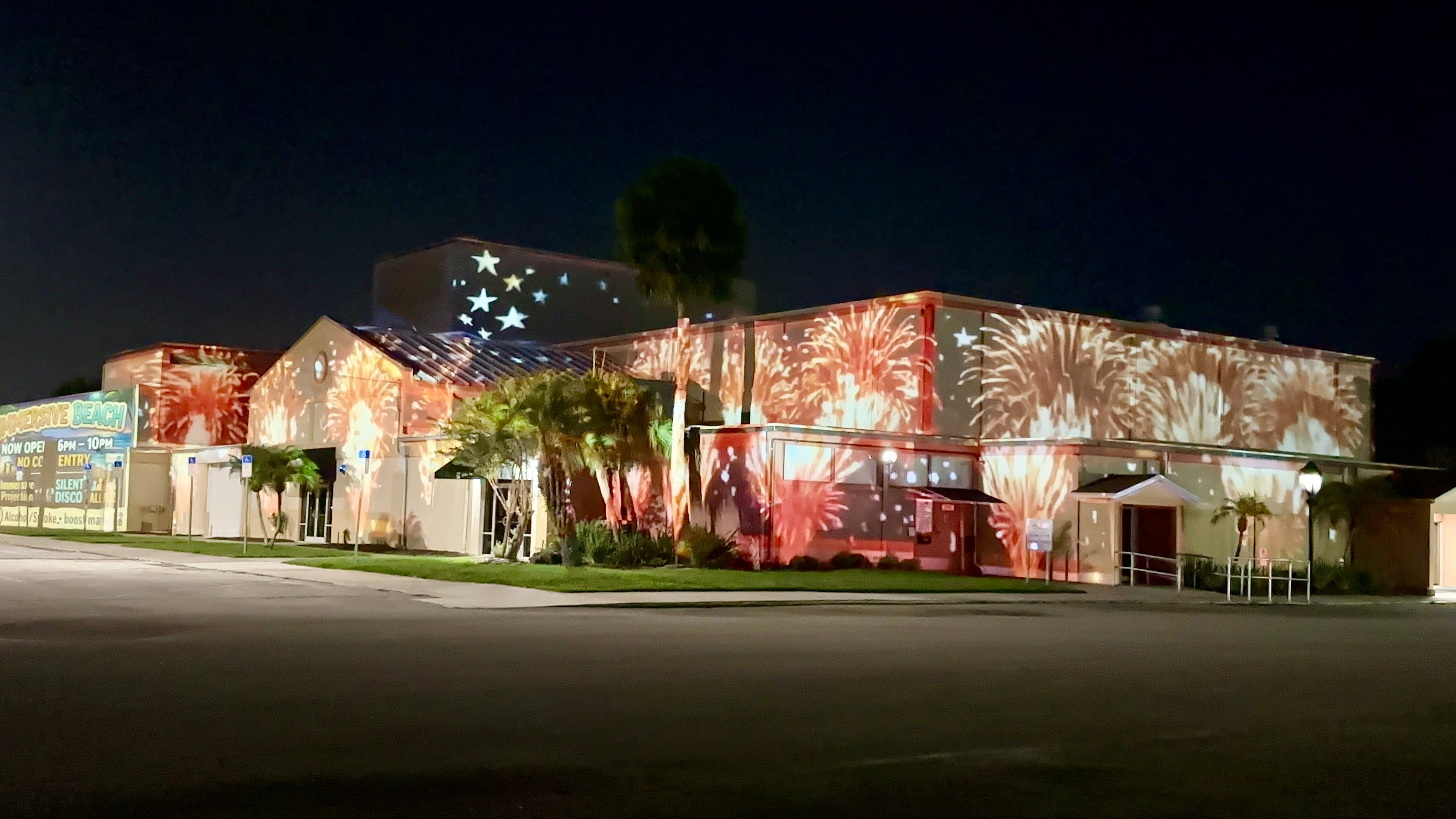 American flag and fireworks projection mapping on a building