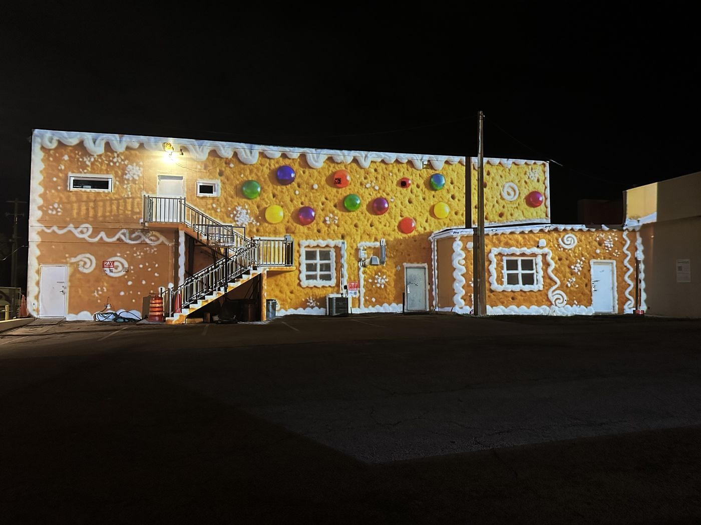 Gingerbread-themed Christmas projection show on a home